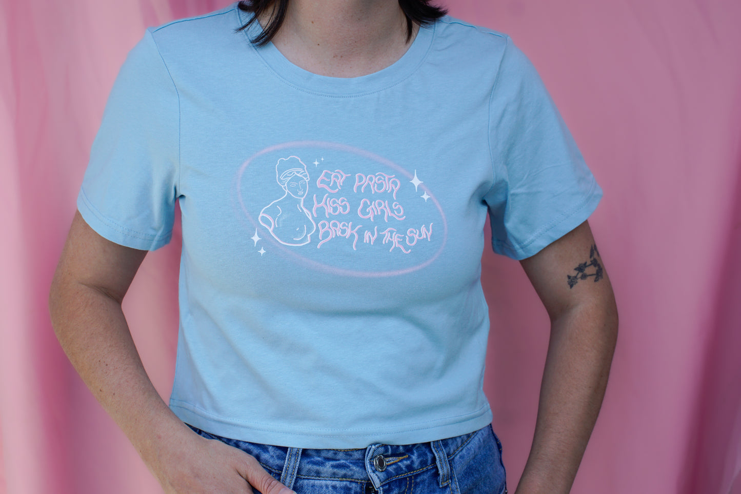 Eat pasta, kiss girls, bask in the sun baby tee.